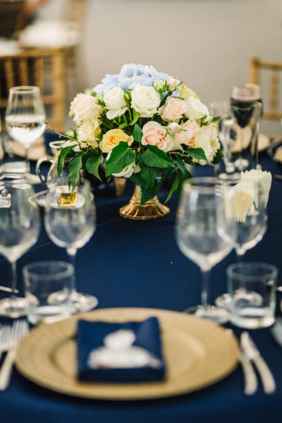 istock Gift for a wedding guest. Hydrangea and roses floral wedding decoration. 1340810427
