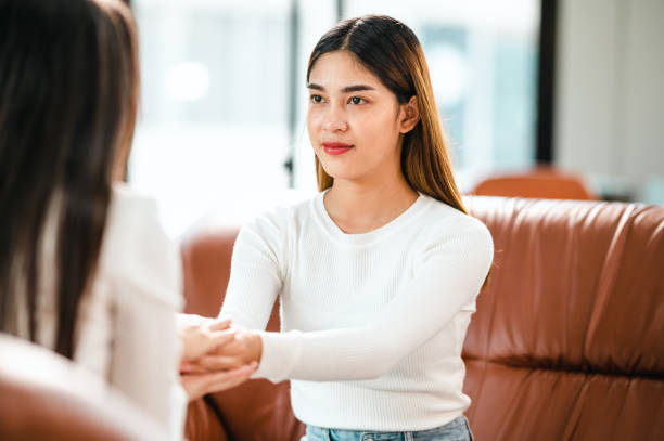 istock Psychologist provide assistance understanding problems of a woman patient 1340812318