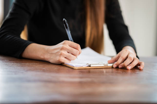 istock close-up female student sit for exam at university classroom students sitting in the row education lifestyle university college 1340812472