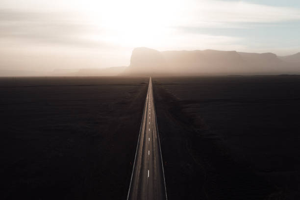 istock Endless straight road into the sun on Iceland 1340814324