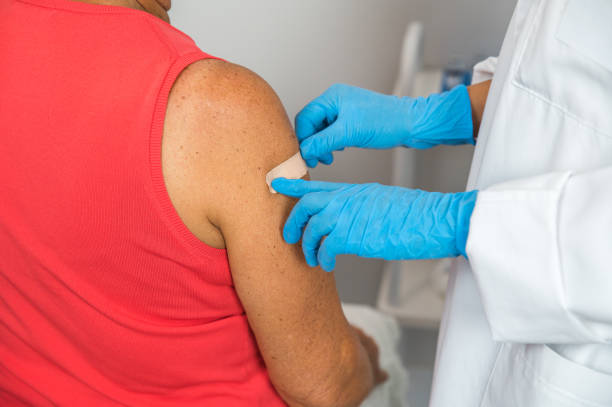 istock Crop doctor sticking patch after vaccination 1340815401