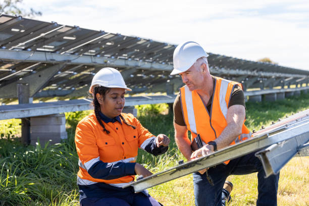 istock Senior Engineer and Aboriginal Australian Apprentice Working Together On Solar Farm Installation 1340816908