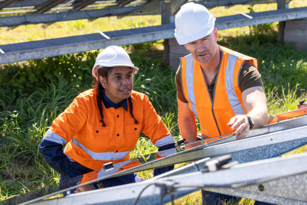 istock Senior Engineer and Aboriginal Australian Apprentice Working Together On Solar Farm Installation 1340816913