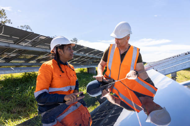istock Senior Engineer and Aboriginal Australian Apprentice Working Together On Solar Farm Installation 1340816925