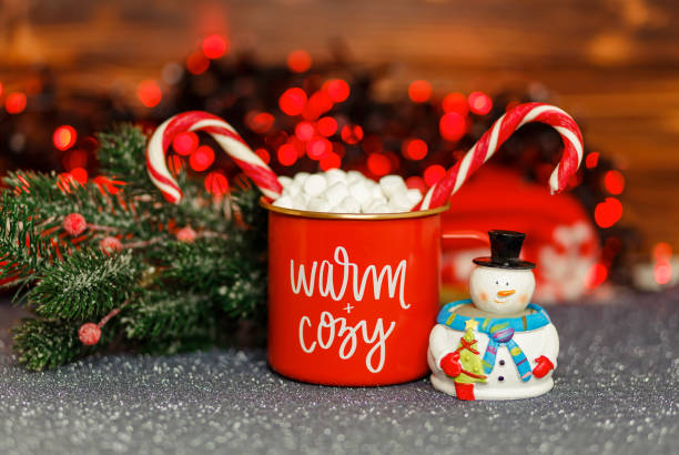 istock Hot winter drink. Chocolate with whipped cream in red mug. 1340821446