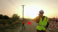 istock Hispanic Male and Female Road Construction and Maintenance Workers in Western USA 4K Video 1340823262