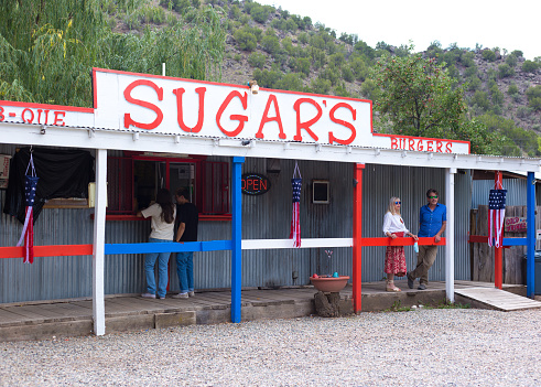 Embudo, NM: Customers at a fast-food restaurant in Embudo, a rural village on the Rio Grande River between Santa Fe and Taos, NM.