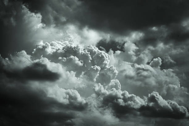 istock Gray stormy cumulus clouds. Gloomy cloudy sky background with copy space for design. 1340824312
