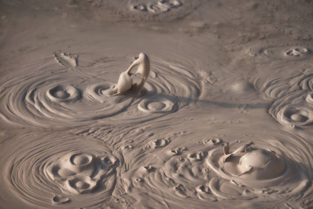 Mud Bubbling in Mudpot in Yellowstone National Park - geothermal feature