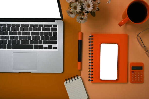 istock Mock up mobile phone, coffee cup, notebook and calculator on accountant workspace. 1340842825