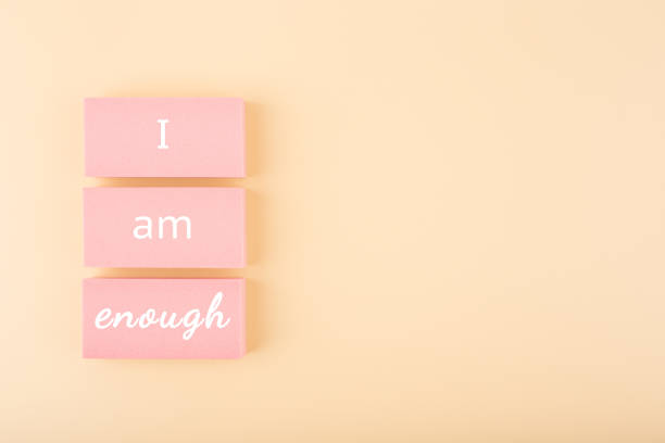 istock I am enough concept on pastel beige bright background 1340846070
