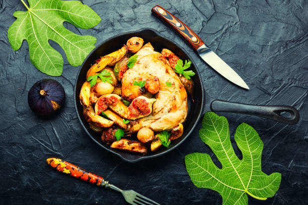 istock Chicken baked with potatoes and figs 1340846626