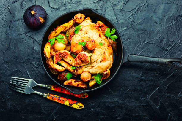 istock Chicken baked with potatoes and figs 1340846741
