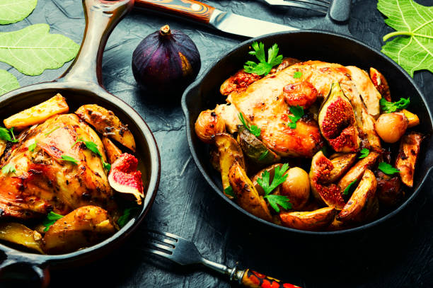 istock Baked chicken leg with potatoes and figs 1340846786
