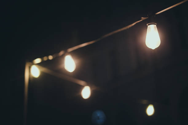 Light bulbs in the backyard of a vegan restaurant. Cracow. One of the main streets. No people. Krakow in Poland