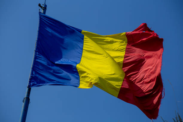 istock Romanian flag against a blue sky on Cetadea Deva, Transylvania 1340848871