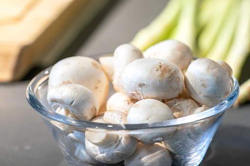 Straw mushroom is prepared in the glass bowl for ingredient of cooking.