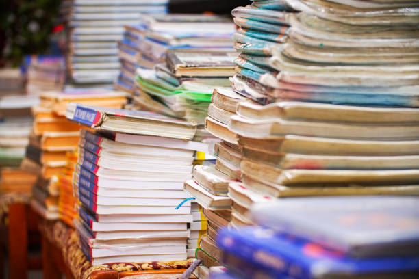 istock Stacks of old books in the library 1340860615