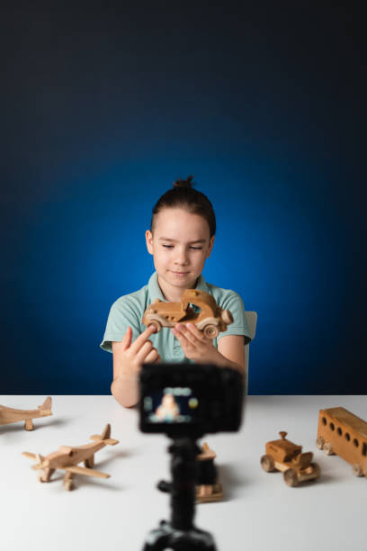 istock Young boy video blogger making stream with his followers. 1340863520