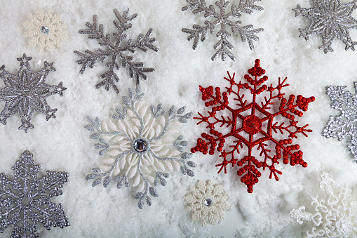 Snowflakes in the snow. Christmas background.