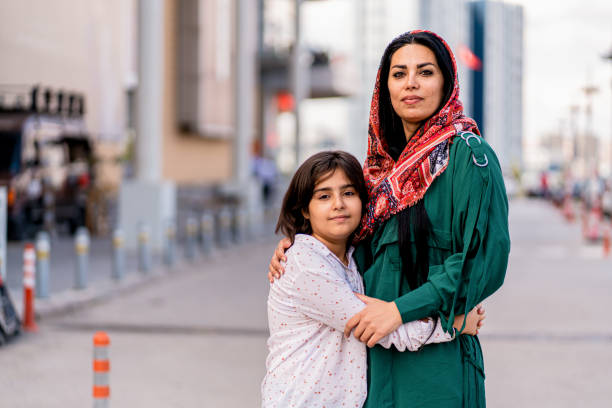 middle eastern mother and daughter stock photo