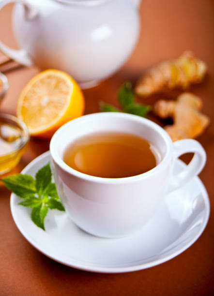 istock Refreshing ginger tea with lemon, mint leaf and honey 1340866425