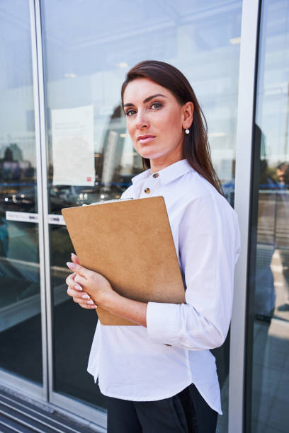 istock Confident woman following black and white dress code 1340867493