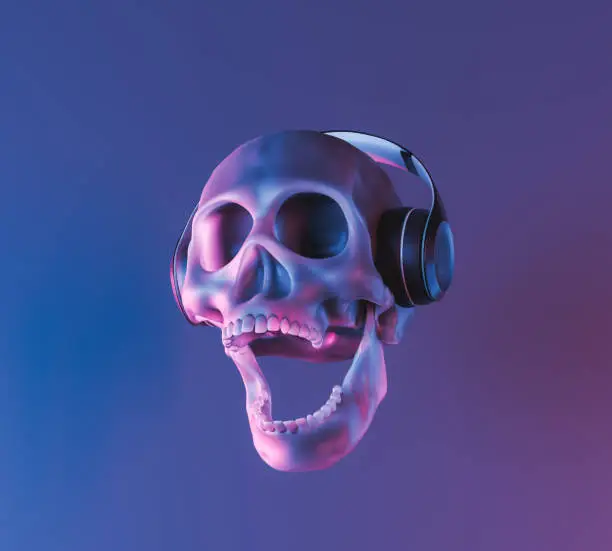 Photo of skull with neon lighting and headphones