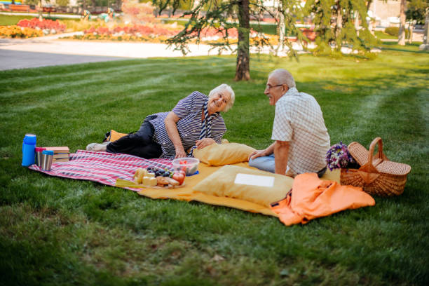 istock Old senior couple having picnic 1340870871