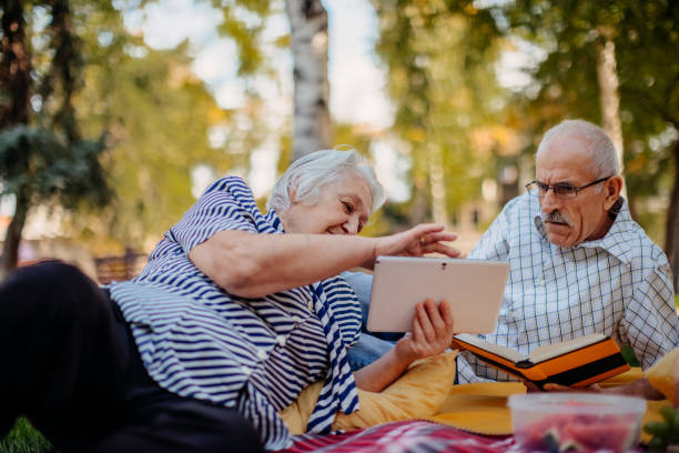 istock Old senior couple having picnic 1340871083