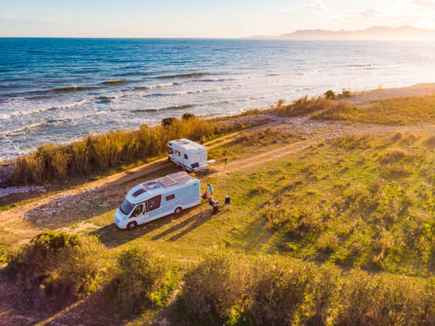 Caravan camping on coast. Aerial view stock photo