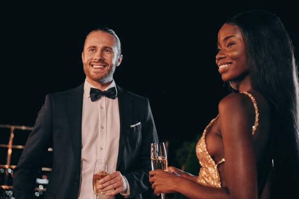 istock Beautiful young couple in formalwear 1340871430