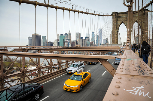 New York, USA - 03 27 2018: New York City Brooklyn Bridge traffic.