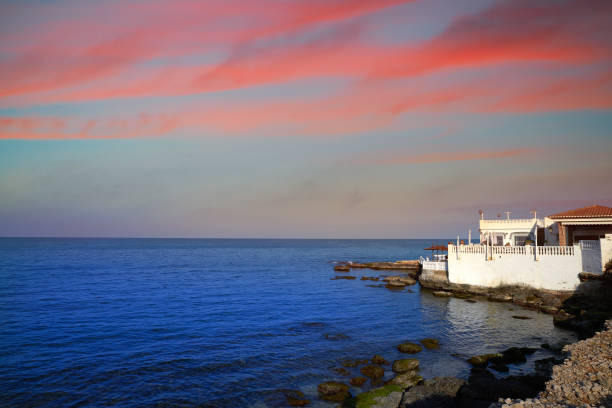 Denia sunset from Las Rotas beach in alicante of Spain