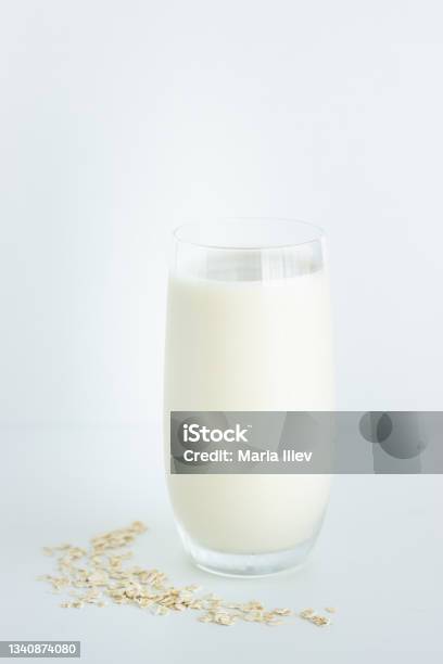 Glass Of Oat Milk On White Background Stock Photo - Download Image Now - Breakfast, Cereal Plant, Close-up