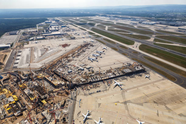Terminal 3 Construction Site Frankfurt Airport airplanes aerial view Frankfurt, Germany - May 27, 2020: Terminal 3 Construction Site Frankfurt Airport airplanes aerial view in Germany. frankfurt international airport stock pictures, royalty-free photos & images
