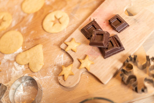 istock Woman baking at home: Cookies preparation ingredients 1340875927