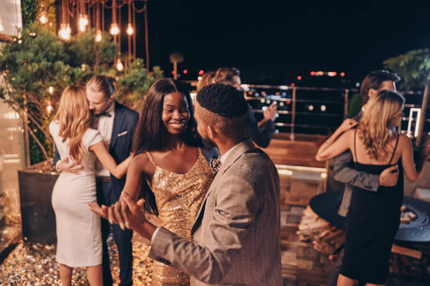 istock Beautiful young people dancing and smiling 1340876774