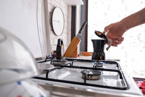 istock Preparing morning coffee in the home kitchen 1340877526