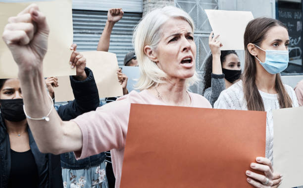 istock Shot of a mature woman protesting 1340877532