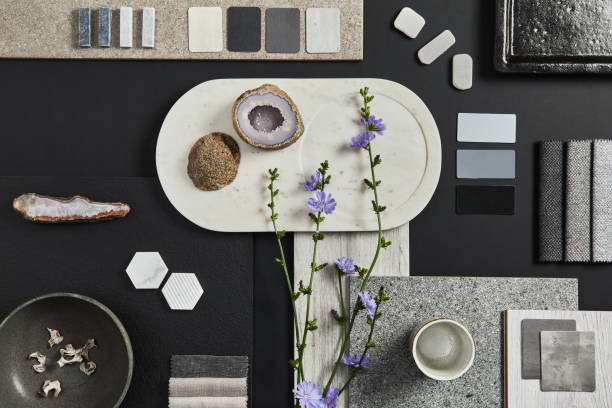 istock Flat lay composition of creative black architect moodboard with samples of building, textile and natural materials and personal accessories. Top view, black background, template. 1340877646