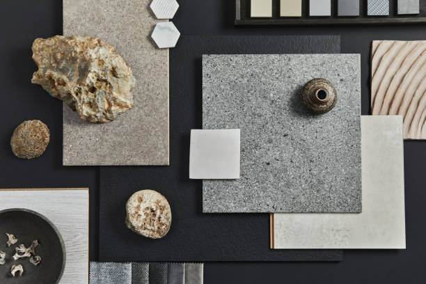 istock Flat lay composition of creative black architect moodboard with samples of building, textile and natural materials and personal accessories. Top view, black background, template. 1340877649