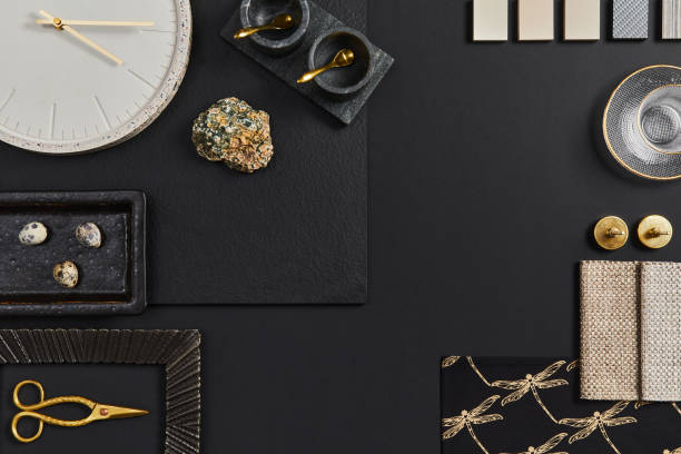 istock Flat lay composition of creative black architect moodboard with samples of building, textile and natural materials and personal accessories. Top view, black background, template. 1340877650