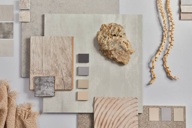 istock Flat lay of creative architect moodboard composition with samples of building, textile and natural materials and personal accessories. Top view, grey background, template. 1340877654