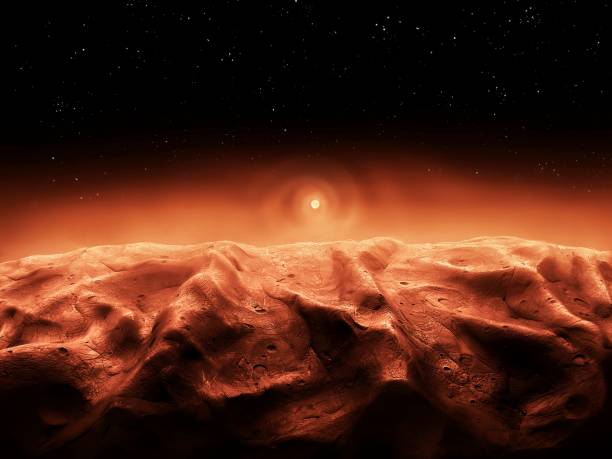 View from the surface of Mars. Mountains, canyons and craters on the surface of the red planet. Sunrise in the sky.