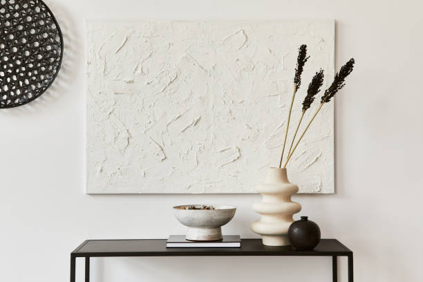istock Minimalistic composition of creative room interior with mock up structure painting, metal shelf and personal accessories. Black and white concept. Template. 1340882109