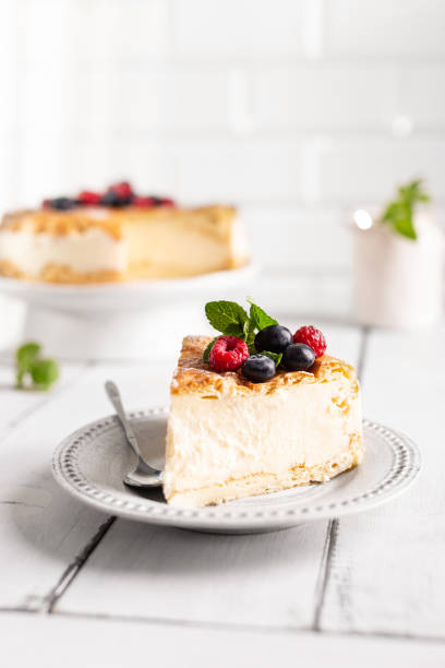 istock Vanilla cheesecake decorated with berries on a plate 1340883419