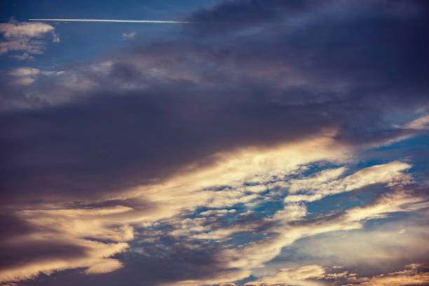 istock Amazing cloudscape on the sky at sunset time. 1340884914