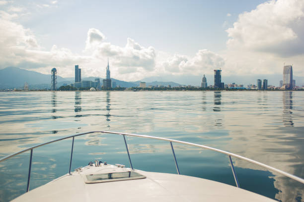 vista su batumi da uno yacht. panorama di batumi. città marina. - ferris wheel foto e immagini stock