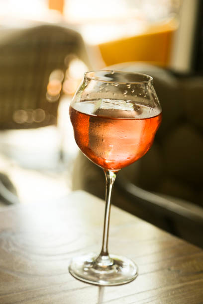 istock Refreshing pink cocktail outdoors 1340890404